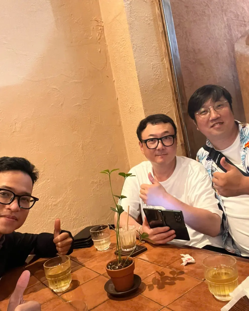 Guests with drinks at a coffee shop