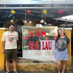 Guests outside a cao lầu restaurant in Hoi An